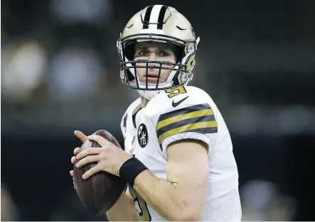  ?? JONATHAN BACHMAN / GETTY IMAGES ?? Saints quarterbac­k Drew Brees says the game plan never changes — “just focus on winning.”