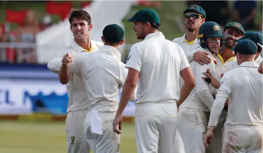  ??  ?? GOT YOU, MATE! Mitchell Marsh and the rest of the Australian team celebrate the dismissal of Aiden Markram at Kingsmead yesterday.