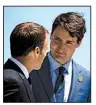  ?? AP/EVAN VUCCI ?? French President Emmanuel Macron (left) and Canadian Prime Minister Justin Trudeau talk Friday at welcoming ceremonies for Group of Seven leaders in Charlevoix, Quebec.