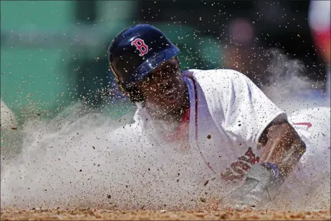  ?? GERALD HERBERT — THE ASSOCIATED PRESS ?? Boston Red Sox Greg Allen scores as he slides into home plate in the fourth inning of a spring training baseball game in Fort Myers, Fla., Sunday, March 12, 2023.