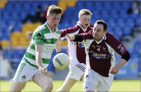  ??  ?? Ballymanus’s Roan Lynch and Stratford’s James Barrett compete for thr ball during the IFC in Aughrim.