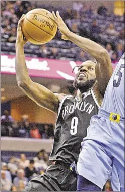  ?? PHOTO BY AP ?? DeMarre Carroll scores season-high 24 points as the Nets snap a three-game losing streak with a win over Memphis.