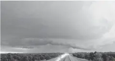  ?? ALONZO ADAMS/AP ?? A tornado forms over Interstate 40 as seen looking west from Midwest City, Okla.