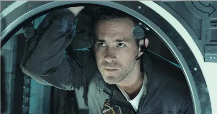  ?? COLUMBIA/SONY PICTURES ?? Canadian actor Ryan Reynolds stars in Life, a science fiction-horror movie that’s not quite out of this world.