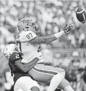  ?? [AP PHOTO] ?? Penn State’s Marcus Allen forces an incompleti­on against Pitt’s Chris Clark