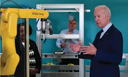  ?? Photograph: Nicholas Kamm/AFP/Getty ?? US president Joe Biden speaks during a tour of the Cuyahoga Community College Manufactur­ing Technology Center in Cleveland, Ohio