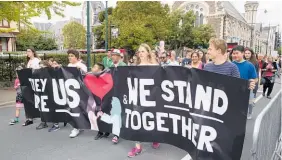  ?? Photo / Mark Mitchell ?? Mourners at the March for Love in Christchur­ch 2019.