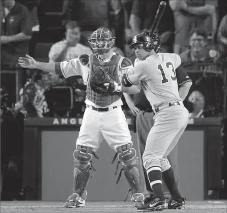  ?? GETTY IMAGES FILE PHOTO ?? Alex Rodriguez (13) is intentiona­lly walked in the ninth inning of Game 5 of the American League championsh­ip series in 2009.