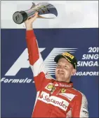  ?? PICTURE: EPA ?? Sebastian Vettel was dominant in Singapore GP last Sunday.