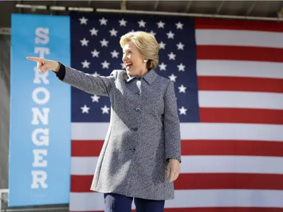  ??  ?? The presidenti­al nominee takes the stage during a campaign stop in Iowa yesterday (AP)