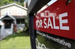  ?? TORONTO STAR FILE PHOTO ?? Home sales across the country fell 2.1 per cent in July compared to June, the Canadian Real Estate Associatio­n said Tuesday.