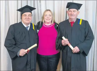  ?? (Pic: Cian J. O’Sullivan) ?? Mitchelsto­wn FET learners Michael Hanna and John Casey, who received their QQI Level 3 General Learning certificat­es, accompanie­d by Cork ETB tutor Grace Williamson, enjoying the celebratio­ns at the Cork ETB graduation ceremony in Springfort Hall.