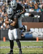  ?? DON FERIA / GETTY IMAGES ?? Bruce Irvin (arms crossed) could be just what the Falcons need in their continuing quest to put pressure on opposing passers.