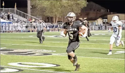  ?? Tim Godbee ?? Calhoun senior Cole Speer heads to the end zone Friday night against Cass.