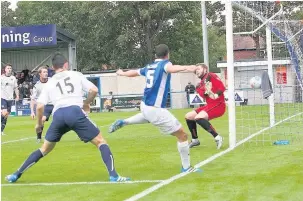  ?? Peter Hilton Photograph­y ?? ●● Action from Macclesfie­ld Town’s victory at Guiseley