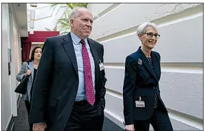  ?? AP/J. SCOTT APPLEWHITE ?? Former CIA Director John Brennan and Wendy Sherman, who helped negotiate the Iran nuclear deal, arrive Tuesday on Capitol Hill for a private briefing on Iran with Democrats.