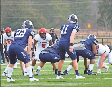  ?? Amy Decker Photograph­y ?? Berry sophomore quarterbac­k Gavin Gray (11) prepares to run a play with freshman running back Jonahan Maisonave in the backfield vs. Rhodes College at Valhalla Stadium on Saturday, Feb. 27.