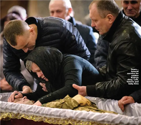  ?? Picture: LEON NEAL/GETTY IMAGES ?? Tears... funeral service for soldier Kobryn Oleg. Left, Valeria and baby Kira