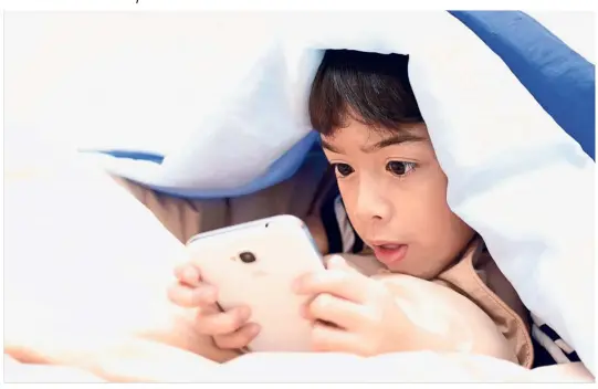  ?? — PP ?? A personal smartphone is a potential source of addiction for a child, which may result in behavioura­l or health issues.