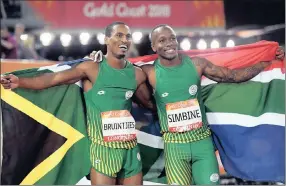  ?? PICTURE: EPA ?? FLASHBACK:
South African sprinters Akani Simbine (right), who won gold, and Henricho Bruintjies, who took silver, celebrate after finishing first and second in the 100m final at the Gold Coast Commonweal­th Games last month.