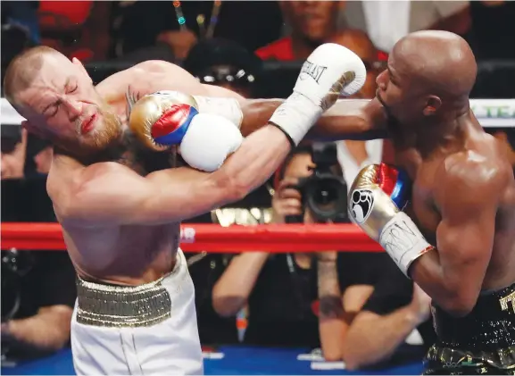  ??  ?? Floyd Mayweather fought UFC star Conor McGregor in Las Vegas in the most money-spinning fight of the year. (AP)