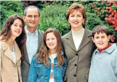  ??  ?? Landmark moments: Mcaleese with her husband Martin, their children Emma, Saramai and Justin just before her inaugurati­on in 1997, inset. Right, meeting Pope John Paul II at the Vatican in 2003. Below, with the Queen during her historic 2011 visit