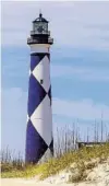  ??  ?? The historic Cape Lookout Lighthouse at Cape Lookout National Seashore.