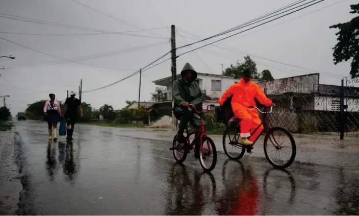  ?? Photograph: Alexandre Meneghini/Reuters ?? Hurricane Ian makes landfall in Cuba’s Pinar del Río province.