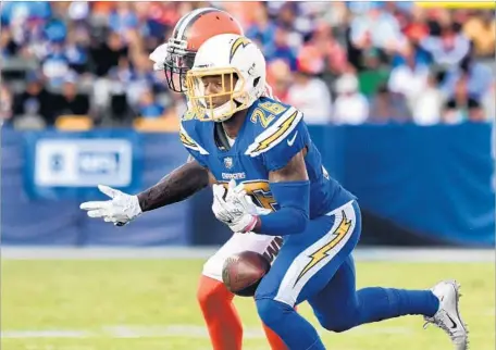  ?? Wally Skalij Los Angeles Times ?? CASEY HAYWARD steps in front of Cleveland receiver Josh Gordon and almost comes up with an intercepti­on during the third quarter of the Chargers’ game against the Browns on Sunday. The cornerback missed practice this week after the death of his brother.