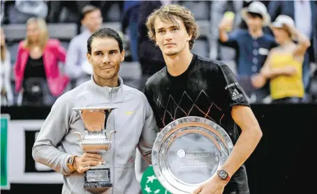  ?? BILD: SN/APA/AFP/FILIPPO MONTEFORTE ?? Rafael Nadal holte mit einem Dreisatzsi­eg über Alexander Zverev seinen achten Titel in Rom.