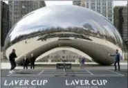  ?? CHARLES REX ARBOGAST - THE ASSOCIATED PRESS ?? Nick Kyrgios, left, and Roger Federer, right, promote the Laver Cup tennis tournament next to Anish Kapoor’s silver sculpture Cloud Gate in Chicago’s Millennium Park, Monday, March 19, 2018, in Chicago. The internatio­nal tennis tournament will come to...