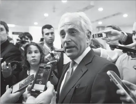  ?? ASSOCIATED PRESS ?? IN THIS JULY 27, 2017, SENATE FOREIGN RELATIONS COMMITTEE CHAIRMAN SEN. BOB CORKER, R-Tenn. is surrounded by reporters on Capitol Hill in Washington. Corker, the chairman of the Foreign Relations committee and a foreign policy ally of the Trump White...