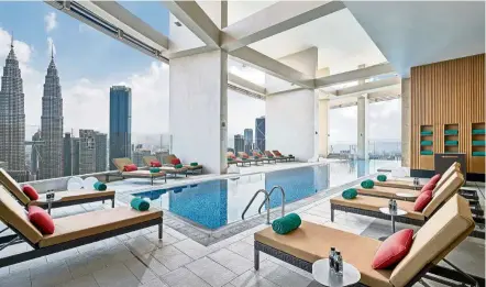  ??  ?? The pool at Banyan Tree Kuala Lumpur has a great view of the Petronas Twin Towers.