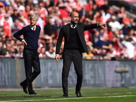  ??  ?? Arsene Wenger and Pep Guardiola will go head to head at Wembley (Getty)