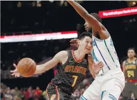  ?? AP FOTO ?? LINSANITY. Jeremy Lin (left) was bought out by the Atlanta Hawks and will become a free agent. He wants to sign with Eastern Conference playoff contender Toronto Raptors.