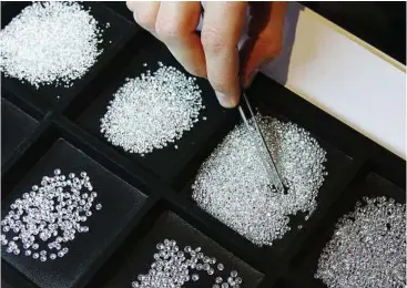  ??  ?? Diamonds in demand: Despite the global financial crises and doldrums of austerity in some traditiona­l Western markets, there is still a huge demand for diamonds. — Reuters