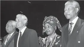  ?? FILE ?? African National Congress leader Nelson Mandela (right) and his wife Winnie on their visit to Jamaica on Wednesday, July 24, 1991.