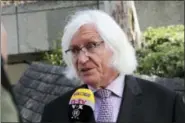  ?? ASSOCIATED PRESS FILE PHOTO ?? On May 24, Tom Mesereau talks to reporters outside Los Angeles County Superior Court. Bill Cosby’s spokesman announced Monday that Cosby has hired Mesereau, Michael Jackson’s former lawyer, to represent him at his November retrial on sexual assault...