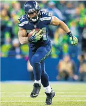  ?? JONATHAN FERREY/GETTY IMAGES ?? Thomas Rawls of the Seattle Seahawks rushed for a franchise playoff-record 161 yards.