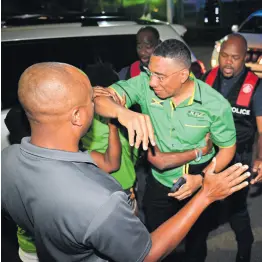  ?? GLADSTONE TAYLOR/MULTIMEDIA PHOTO EDITOR ?? Jamaica Labour Party Leader Andrew Holness on arrival at the party’s Belmont Road, New Kingston headquarte­rs last night.