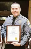  ?? Contribute­d photo ?? Newtown Police Lt. Aaron Bahamonde in 2015.