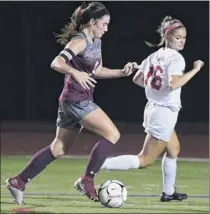  ?? Jenn March / Special to the Times Union ?? Stillwater’s Brooke Pickett moves the ball past Tamarac’s Vanessa Baldwin on Tuesday night at Stillwater High School. Pickett, a junior striker, was the 2017 Times Union Small-school Player of the Year.