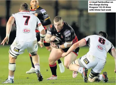  ??  ?? > Lloyd Fairbrothe­r on the charge during Dragons’ 32-32 draw with Ulster last week