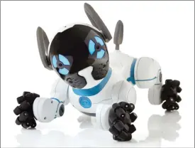  ??  ?? This photo provided by WowWee shows CHiP, a robot dog that cuddles, plays fetch and follows you around the house. Whether you’re looking for something educationa­l, or a toy that’s just for fun, there are a lot of choices for the holidays. — AP