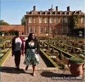  ?? ©National Trust/john Millar ?? RIGHT: Visitors explore the parterre garden at Hanbury Hall and
Gardens, Worcesters­hire