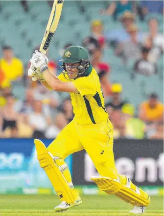  ?? Picture: GETTY IMAGES ?? Travis Head on his way to a match-winning knock of 96 last night.