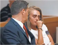  ?? MATT WEST, THE BOSTON HERALD, VIA AP ?? Michelle Carter awaits her sentencing for involuntar­y manslaught­er in a courtroom in Taunton, Mass., on Thursday.