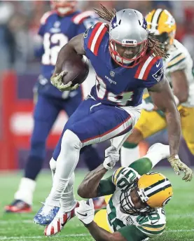  ?? GREG M. COOPER/USA TODAY SPORTS ?? Patriots wide receiver-returner Cordarrell­e Patterson rushed for a team-high 61 yards and a TD Sunday against the Packers.