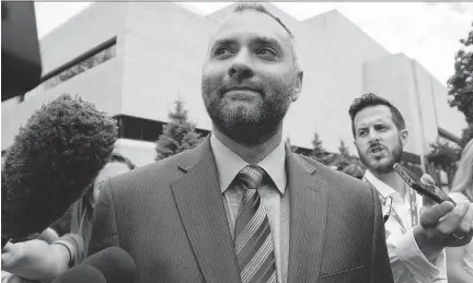  ?? JUSTIN TANG /THE CANADIAN PRESS ?? Benjamin Perrin, former legal adviser for the Prime Minister’s Office, leaves the courthouse in Ottawa following his second day of testimony at the trial of Mike Duffy on Friday. Perrin told the court he was kept out of the negotiatio­ns over Duffy’s...