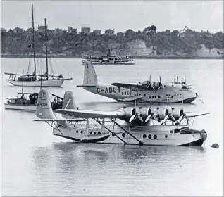  ?? Photo: NATIONAL LIBRARY/REF NO: 1/4-048844\G ?? Flying boats: The Samoan Clipper and Imperial Airways Centaurus at Mechanics Bay, Auckland, in the last week of 1938.